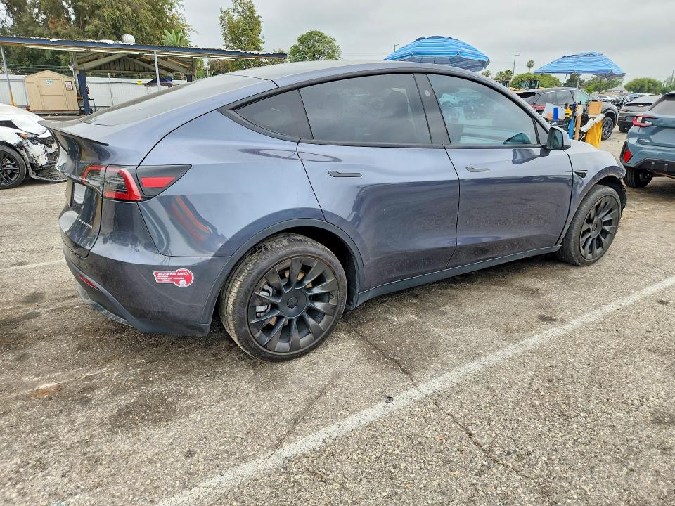 Photo 3 from auction – 2023 TESLA MODEL Y with VIN 7SAYGDEE6PF926587