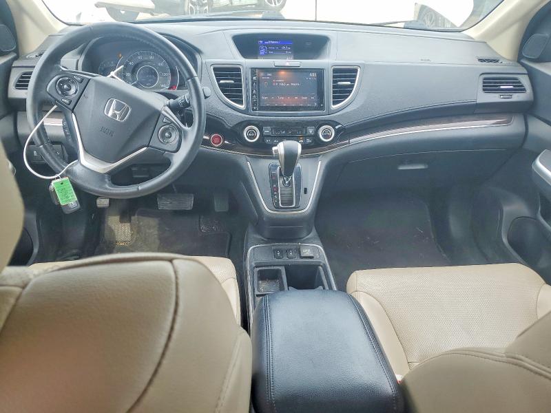 Photo 8 from auction – 2016 HONDA CR-V with VIN 5J6RM4H79GL071463