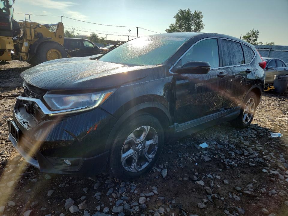 Photo 1 from auction – 2018 HONDA CR-V with VIN 2HKRW2H53JH677470