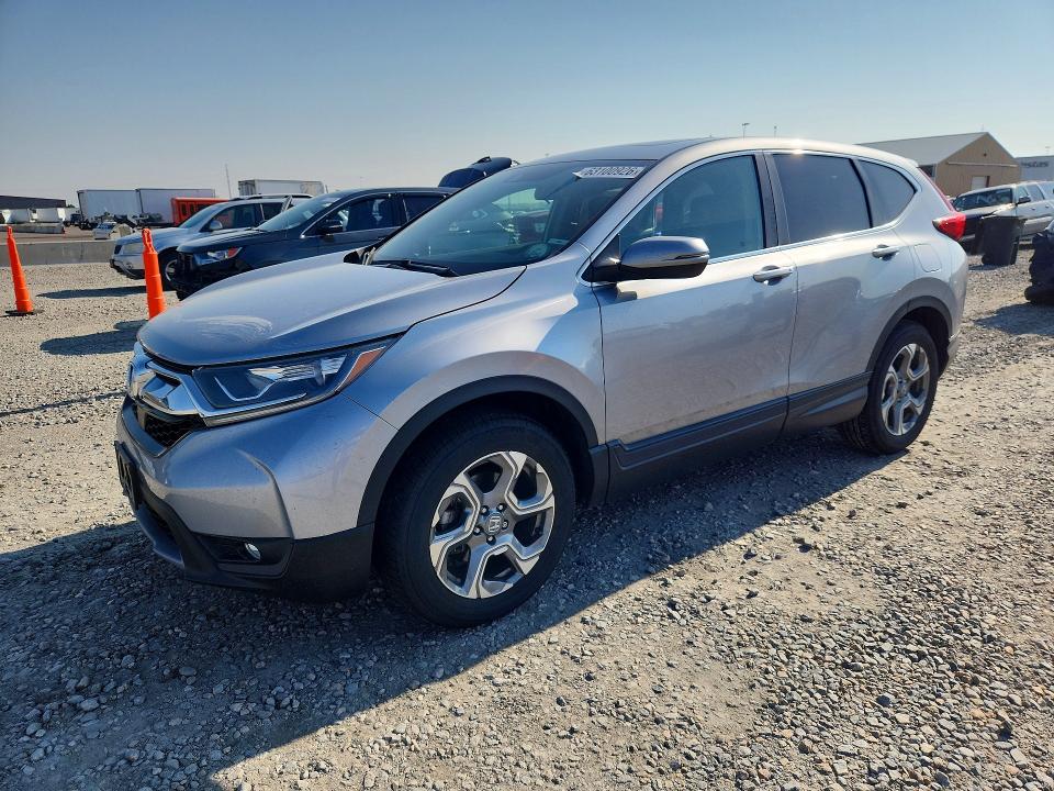 Photo 1 from auction – 2017 HONDA CR-V with VIN 2HKRW2H57HH676395