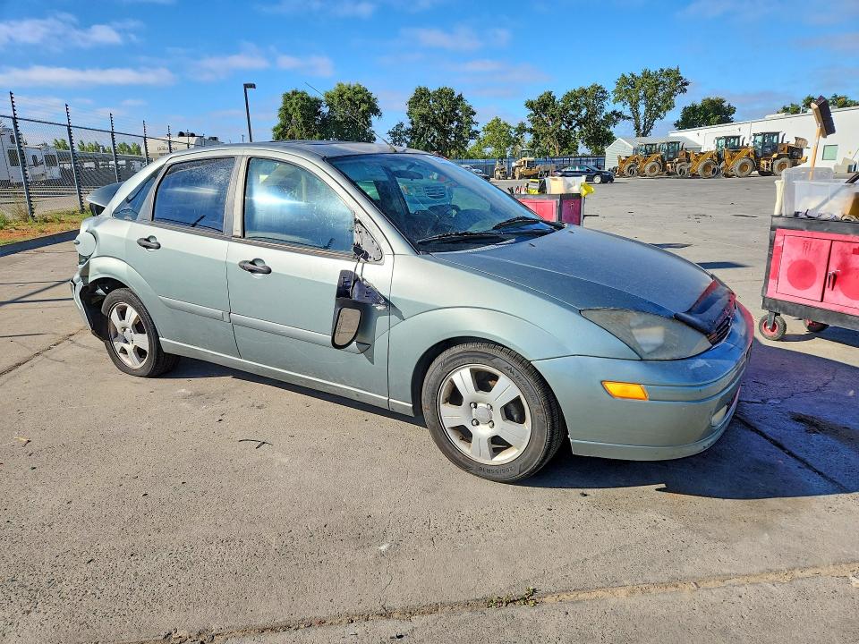 Photo 4 from auction – 2003 FORD FOCUS with VIN 1FAHP38Z13W292462