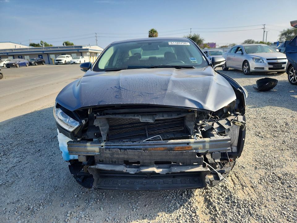 Photo 5 from auction – 2015 FORD FUSION with VIN 3FA6P0LU6FR226062