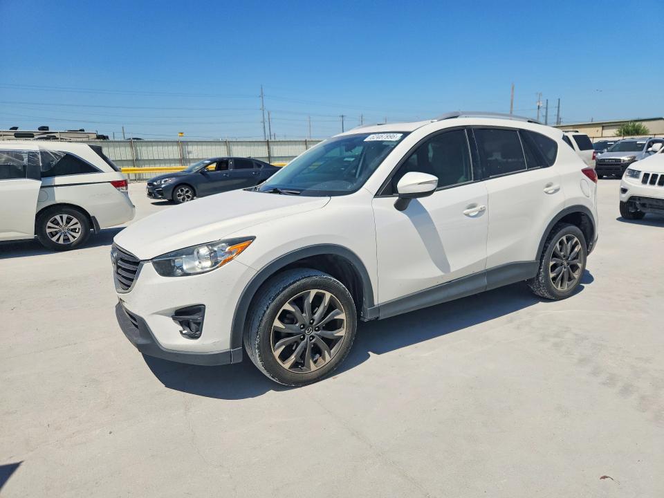 MAZDA CX-5 2016 with VIN JM3KE2DY1G0859458 - Photo from auction