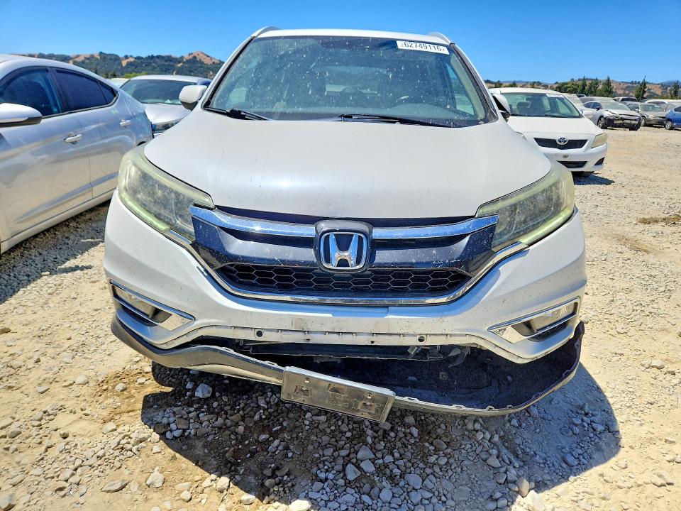 Photo 5 from auction – 2016 HONDA CR-V with VIN 5J6RM3H75GL029883