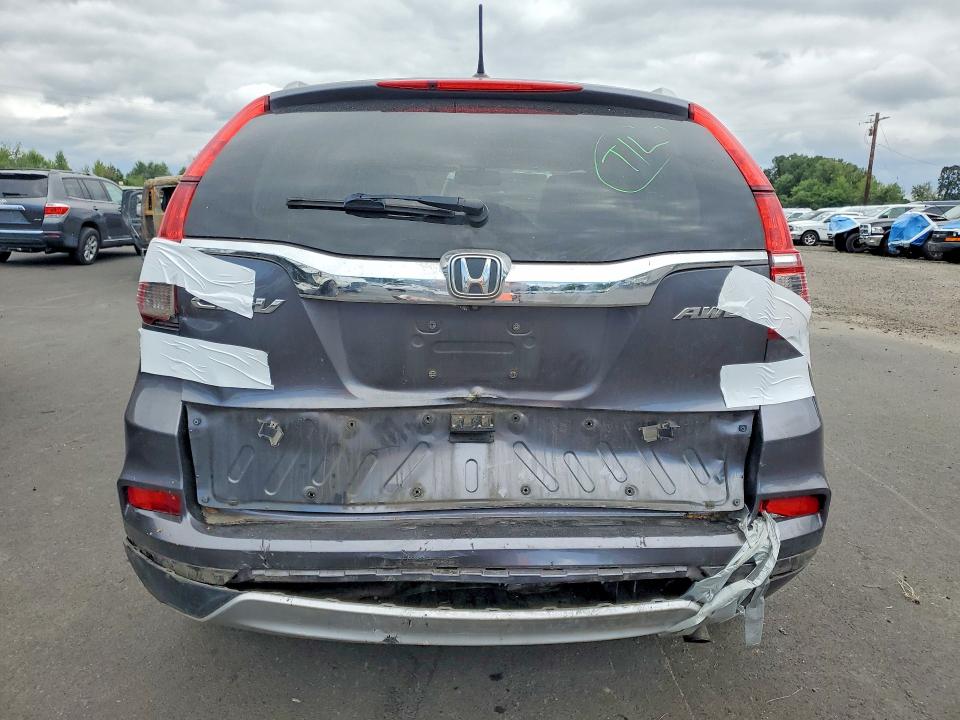 Photo 6 from auction – 2016 HONDA CR-V with VIN 2HKRM4H70GH642218
