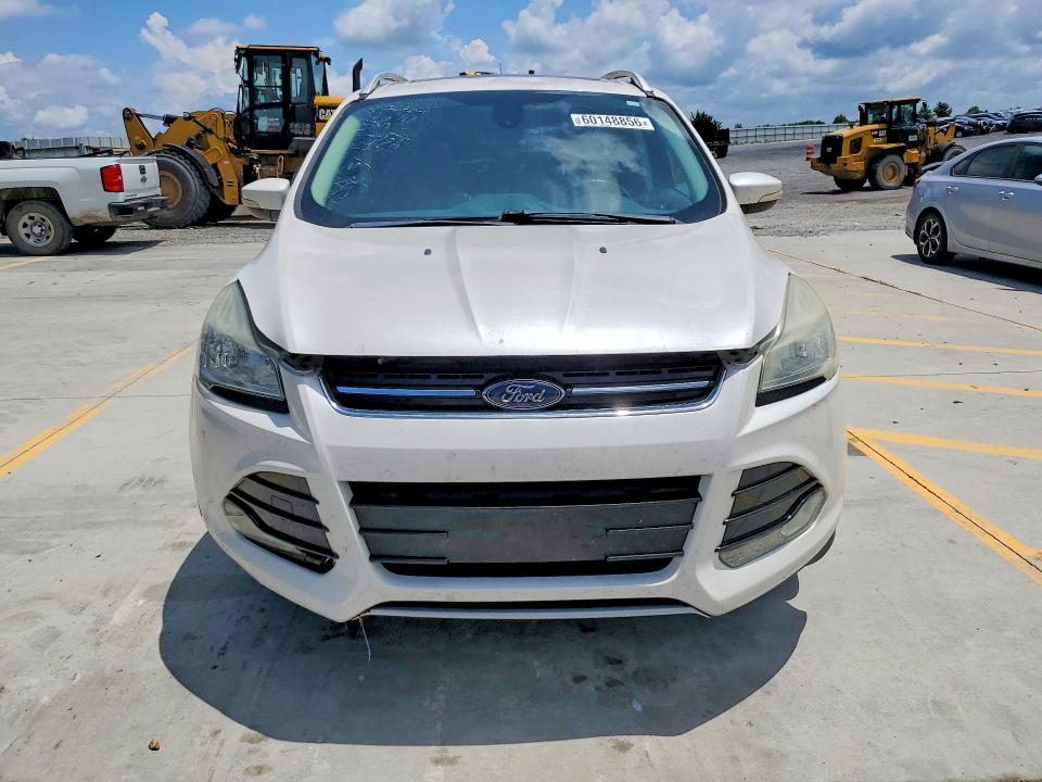 Photo 5 from auction – 2016 FORD ESCAPE with VIN 1FMCU0J91GUA07245