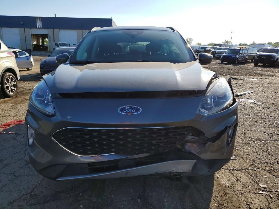 Photo 5 from auction – 2021 FORD ESCAPE with VIN 1FMCU9H67MUB23092