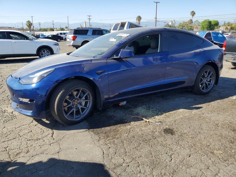 TESLA MODEL 3 2022 with VIN 5YJ3E1EBXNF221919 - Photo from auction
