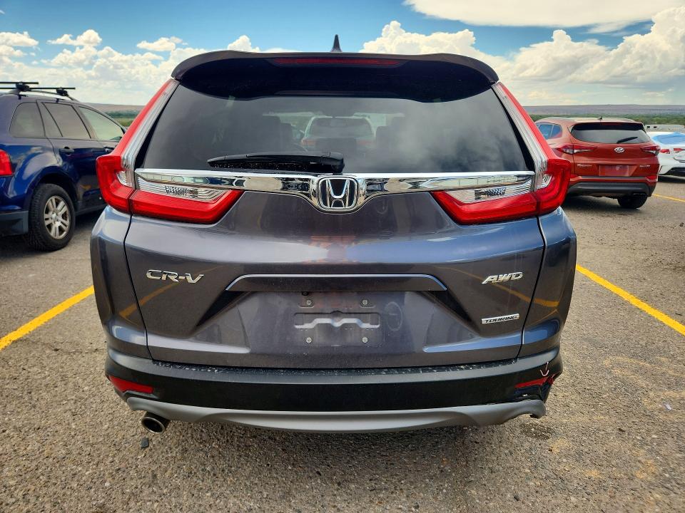 Photo 6 from auction – 2019 HONDA CR-V with VIN 7FARW2H93KE014956