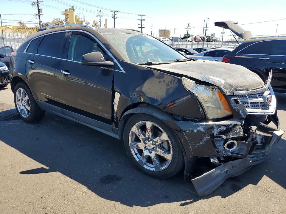Photo 4 from auction – 2011 CADILLAC SRX with VIN 3GYFNBEY8BS554513