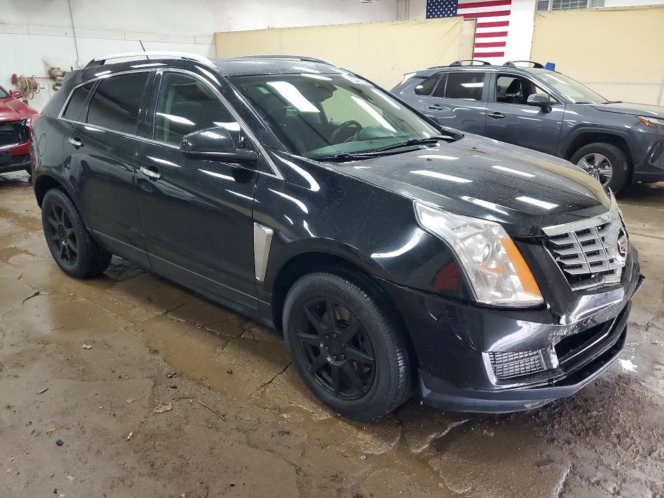 Photo 4 from auction – 2015 CADILLAC SRX with VIN 3GYFNEE31FS640693