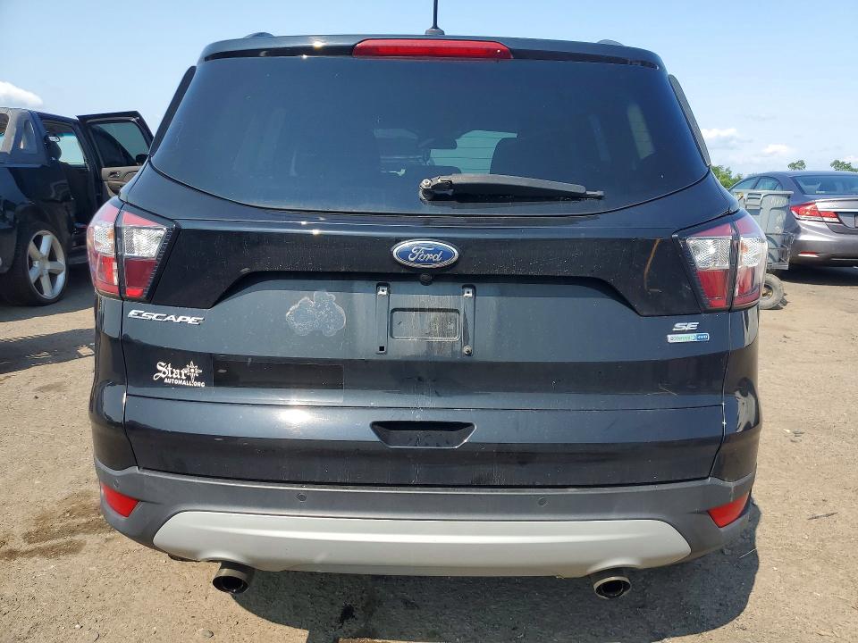 Photo 6 from auction – 2017 FORD ESCAPE with VIN 1FMCU9G94HUE28308