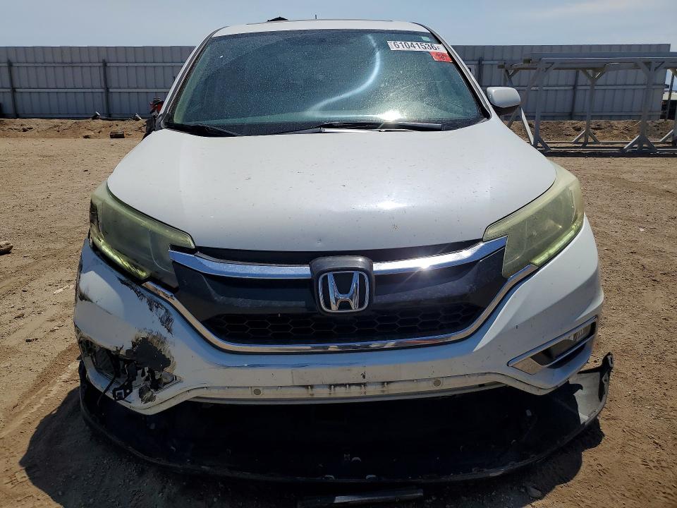 Photo 5 from auction – 2016 HONDA CR-V with VIN 5J6RM4H50GL010162