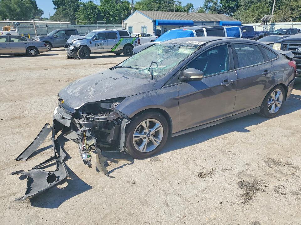 FORD FOCUS 2014 with VIN 1FADP3F2XEL390592 - Photo from auction