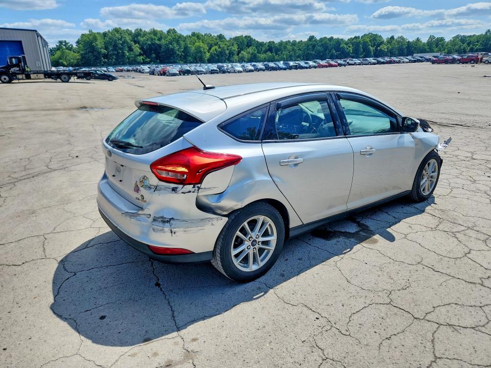 Photo 3 from auction – 2016 FORD FOCUS with VIN 1FADP3K23GL226500