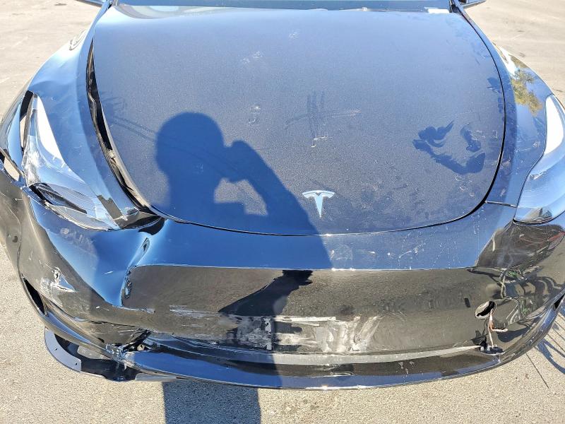 Photo 11 from auction – 2024 TESLA MODEL Y with VIN 7SAYGDED3RF052693