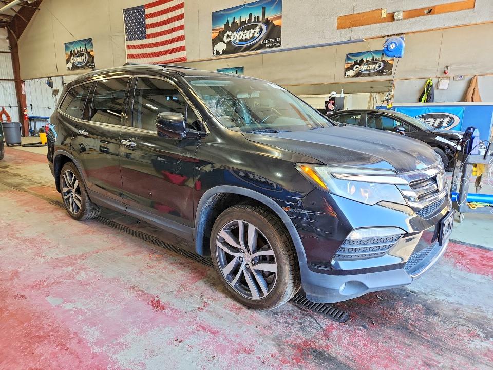 Снимка 4 от търг – 2018 HONDA PILOT с VIN 5FNYF5H90JB011956
