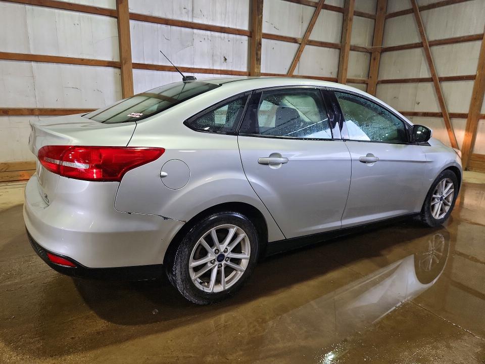 Photo 3 from auction – 2018 FORD FOCUS with VIN 1FADP3FE1JL320208