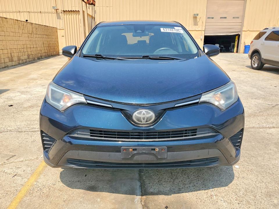 Photo 5 from auction – 2018 TOYOTA RAV4 with VIN JTMZFREV8JJ729986