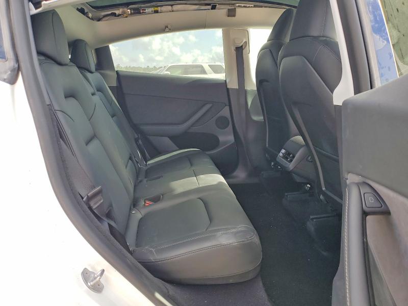 Photo 11 from auction – 2022 TESLA MODEL Y with VIN 7SAYGDEE8NA011394