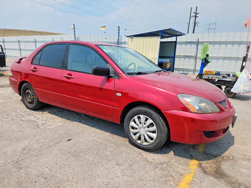 Photo 4 from auction – 2004 MITSUBISHI LANCER with VIN JA3AJ26E94U033530