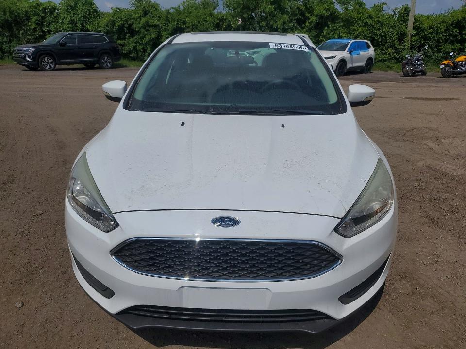 Photo 5 from auction – 2015 FORD FOCUS with VIN 1FADP3K21FL265259