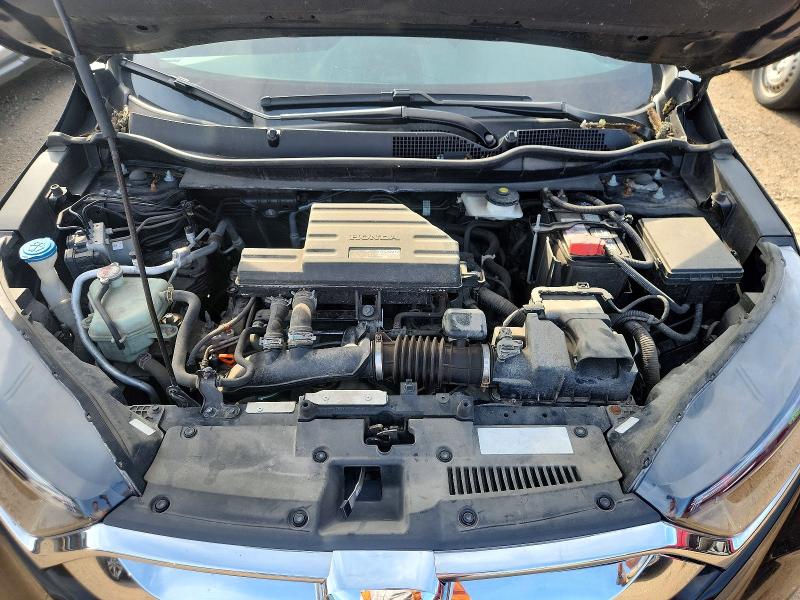 Photo 11 from auction – 2018 HONDA CR-V with VIN 7FARW2H81JE006571