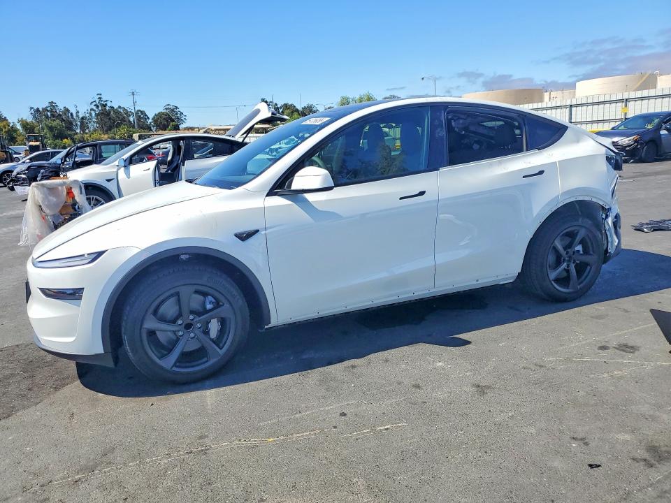 TESLA MODEL Y 2026 with VIN 7SAYGDED0TF647783 - Photo from auction