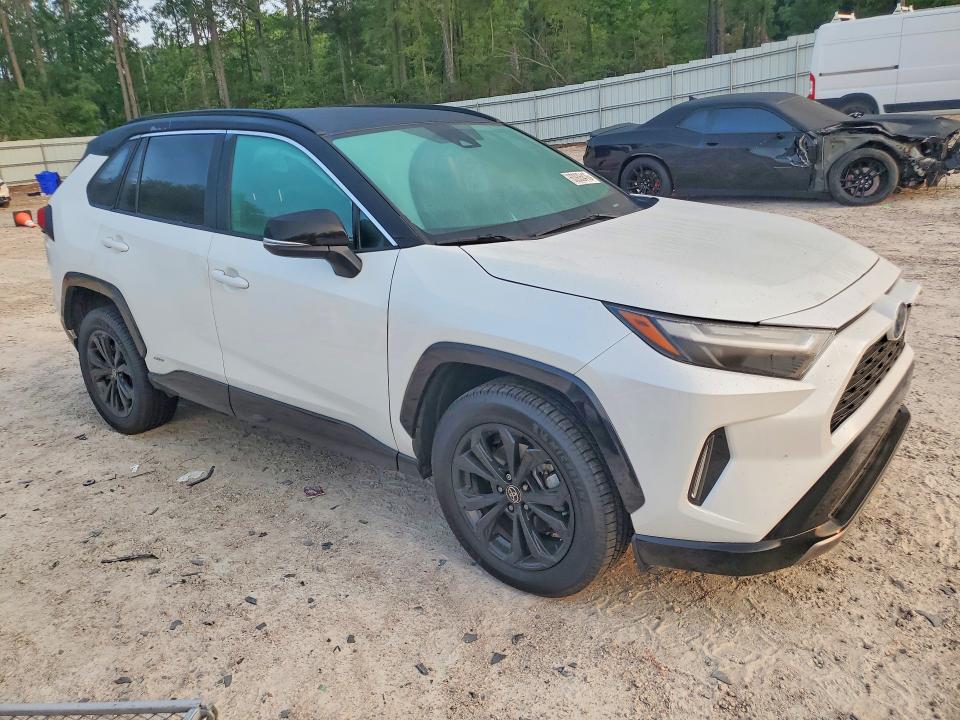 Photo 4 from auction – 2023 TOYOTA RAV4 with VIN 2T3E6RFV9PW042829