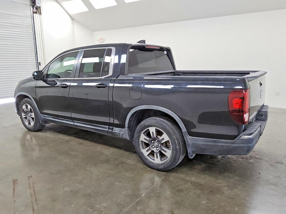Photo 2 from auction – 2017 HONDA RIDGELINE with VIN 5FPYK2F66HB006250