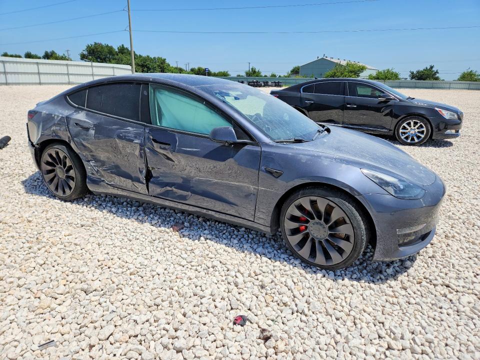 Photo 4 from auction – 2021 TESLA MODEL 3 with VIN 5YJ3E1EC8MF020446