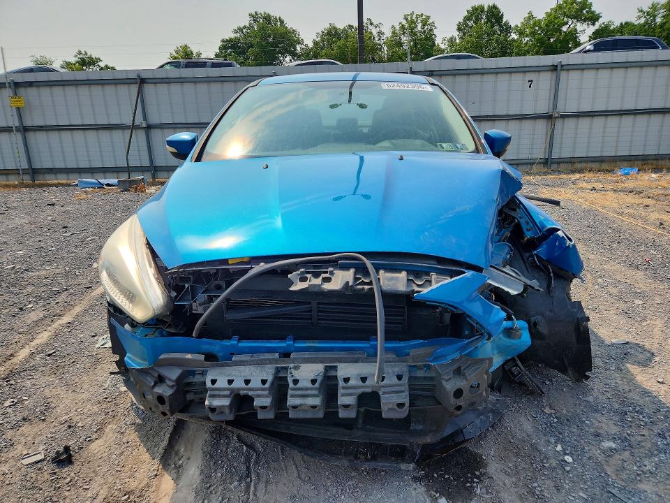 Photo 5 from auction – 2017 FORD FOCUS with VIN 1FADP3F21HL224322