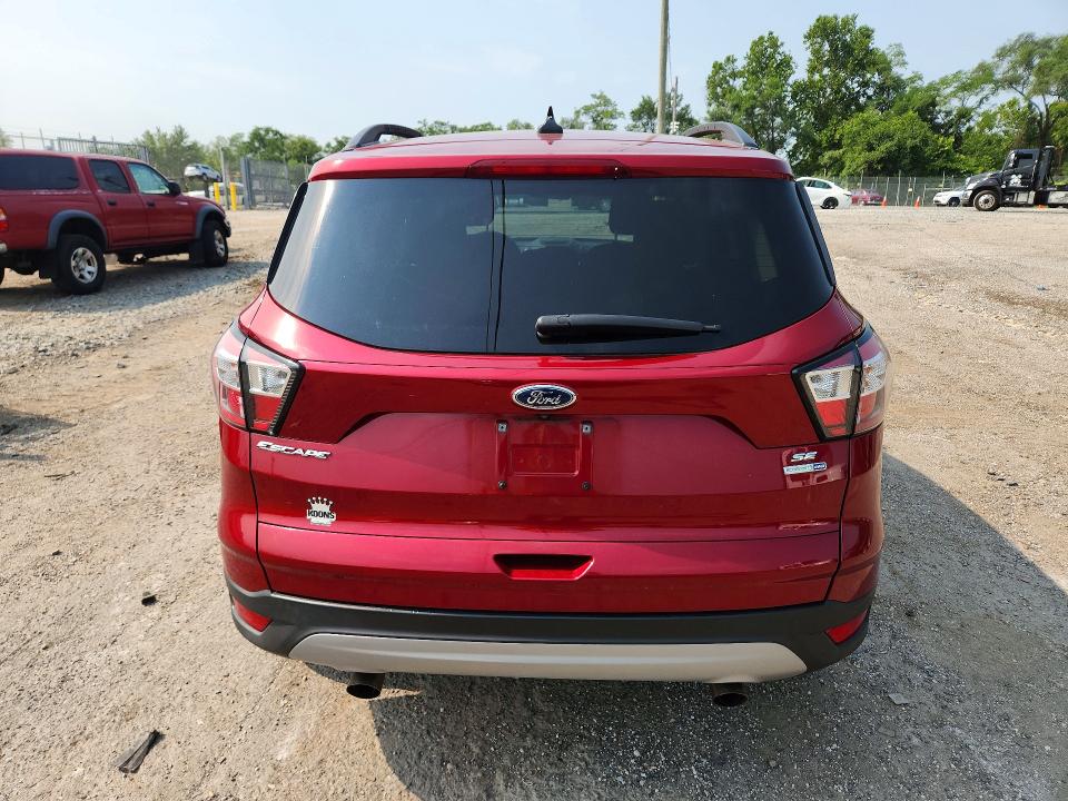 Photo 6 from auction – 2018 FORD ESCAPE with VIN 1FMCU9GD5JUB07324