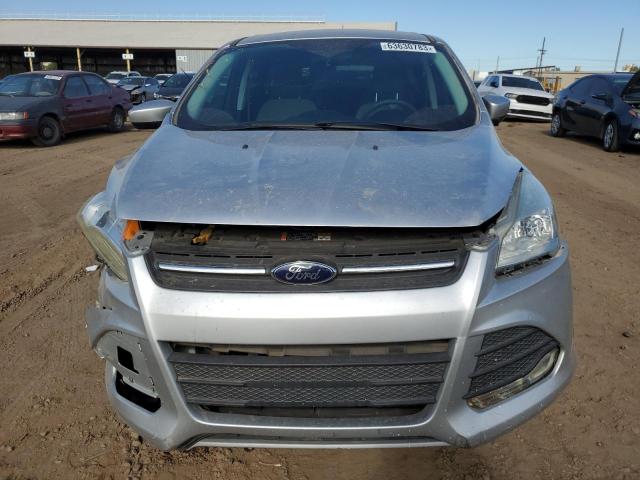 Foto 5 de la subasta – 2014 FORD ESCAPE SE con VIN 1FMCU0G97EUD17792