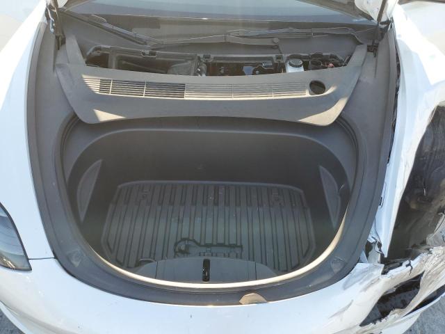 Снимка 11 от търг – 2022 TESLA MODEL 3 с VIN 5YJ3E1EC5NF299131