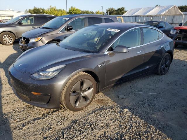 TESLA MODEL 3 2018 with VIN 5YJ3E1EA9JF034656 - Photo from auction