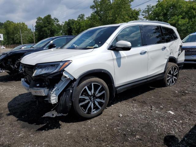 HONDA PILOT TOUR 2021 with VIN 5FNYF6H62MB031237 - Photo from auction