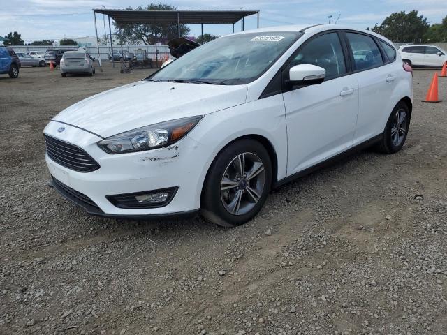 FORD FOCUS SE 2016 with VIN 1FADP3KE6GL362338 - Photo from auction