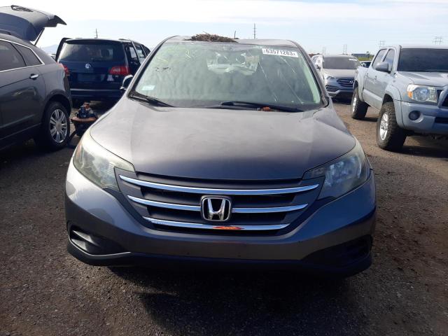 Photo 5 from auction – 2014 HONDA CR-V LX with VIN 2HKRM4H30EH717252