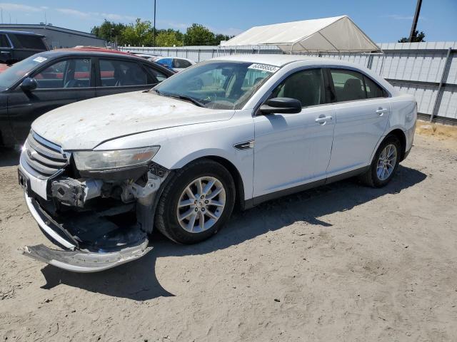FORD TAURUS SE 2014 with VIN 1FAHP2D85EG103073 - Photo from auction