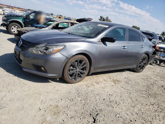 NISSAN ALTIMA 2.5 2018 with VIN 1N4AL3AP3JC267910 - Photo from auction