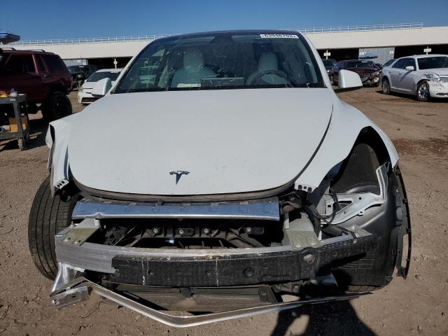 Снимка 5 от търг – 2023 TESLA MODEL Y с VIN 7SAYGAEE8PF591895
