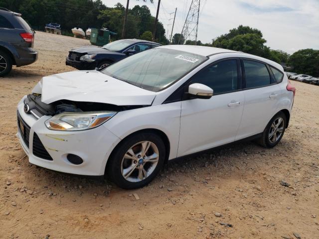 FORD FOCUS SE 2013 with VIN 1FADP3K24DL137031 - Photo from auction