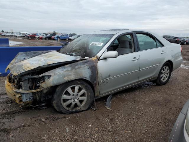 TOYOTA CAMRY LE 2003 with VIN 4T1BE32K83U694181 - Photo from auction