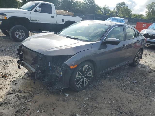 HONDA CIVIC EX 2018 with VIN JHMFC1F33JX020954 - Photo from auction