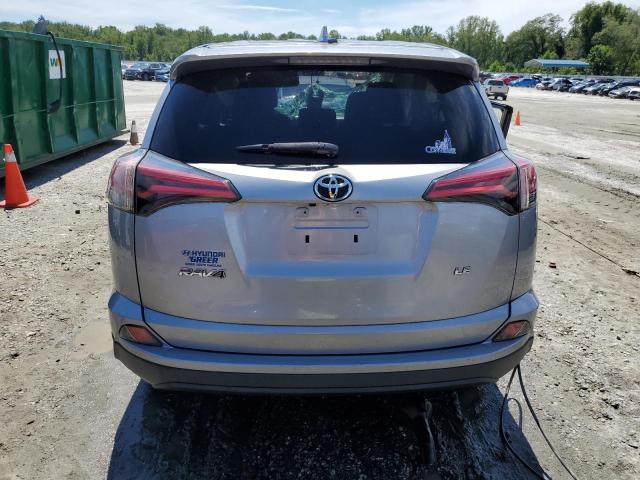 Photo 6 from auction – 2018 TOYOTA RAV4 LE with VIN 2T3ZFREV0JW411474