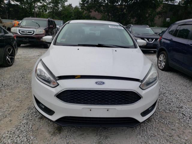 Photo 5 from auction – 2015 FORD FOCUS SE with VIN 1FADP3K22FL282250