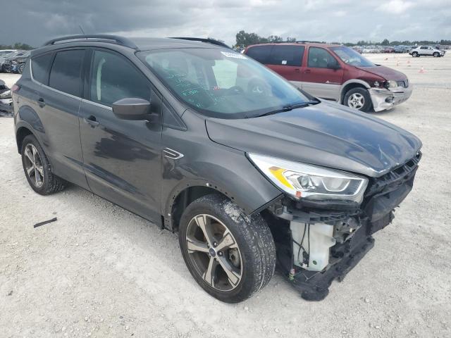 Photo 4 from auction – 2017 FORD ESCAPE SE with VIN 1FMCU9GD4HUB79884