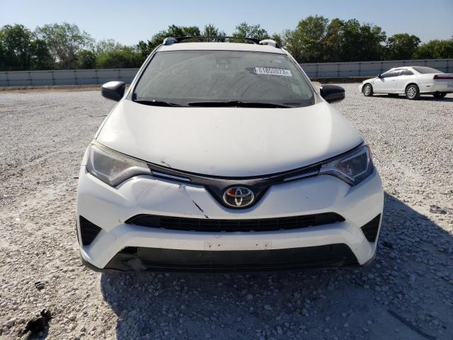 Photo 5 from auction – 2017 TOYOTA RAV4 LE with VIN JTMBFREV5HJ128658