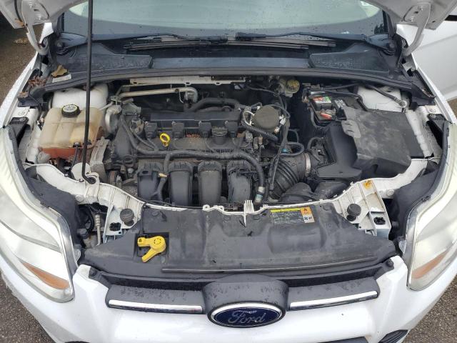 Foto 11 de la subasta – 2012 FORD FOCUS SE con VIN 1FAHP3K29CL374730